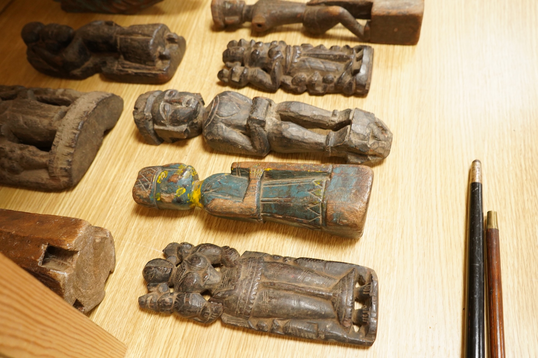 A group of Indian carved figures of deities, largest 42.5cm